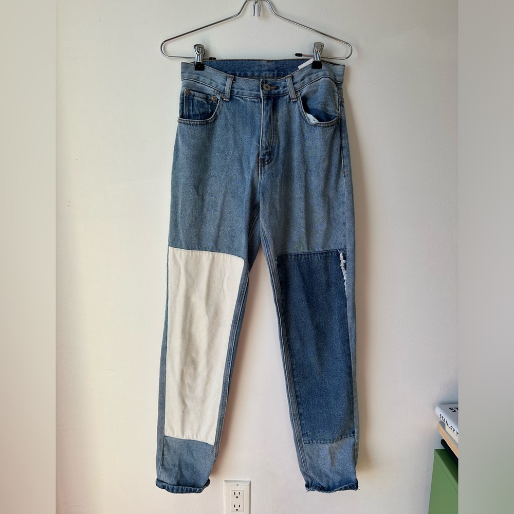Patched slim jeans.